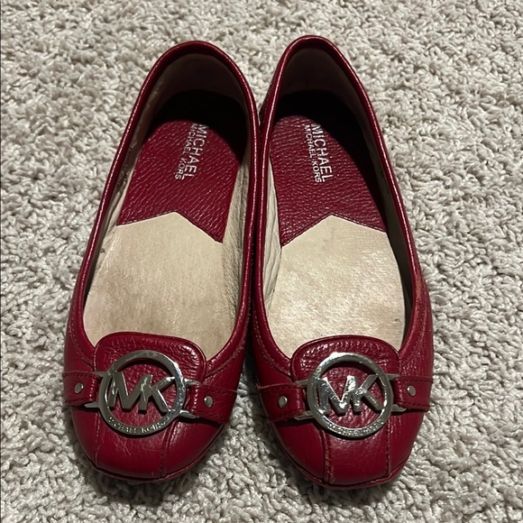 Michael Kors Shoes - Michael Kors Red Flats with Silver Emblem